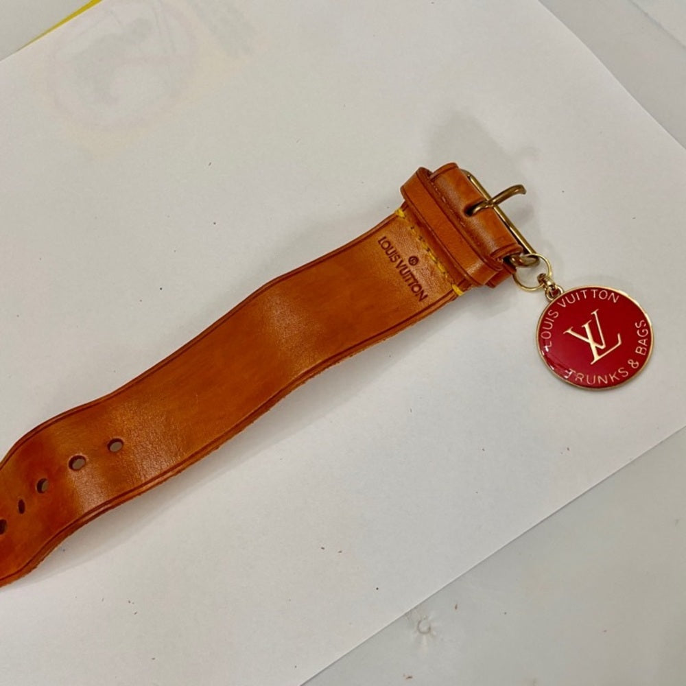 Louis Vuitton Luggage Strap-Bracelet with Red LV Charm (S)