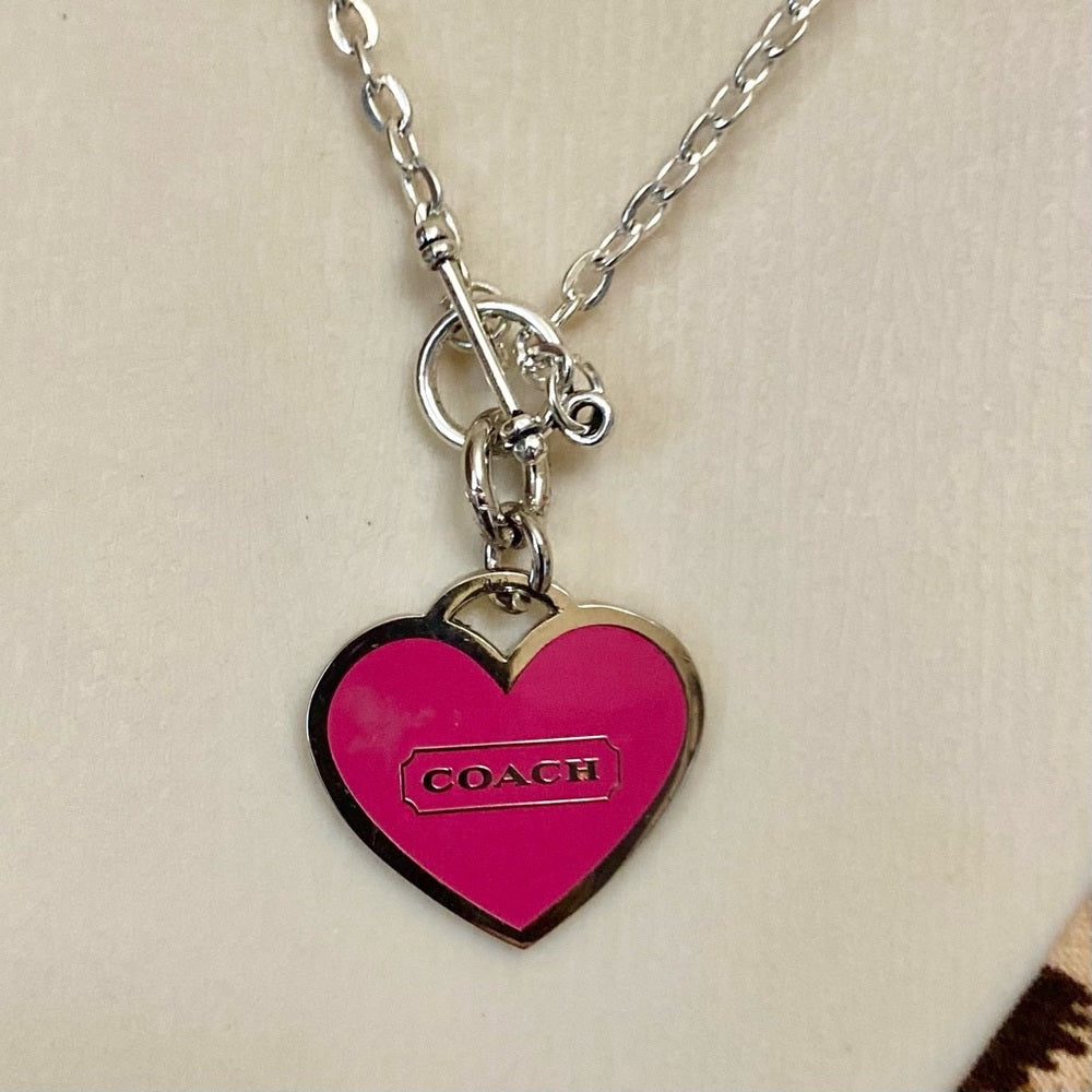 Coach, Shocking Pink Heart Enamel Silver Tone Pendant Necklace