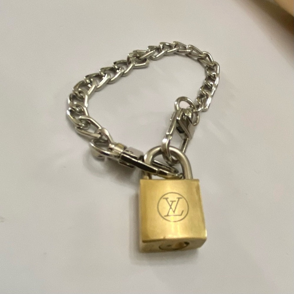 Vintage, Louis Vuitton Brass Padlock with 7-8in Silver Tone Chain Bracelet