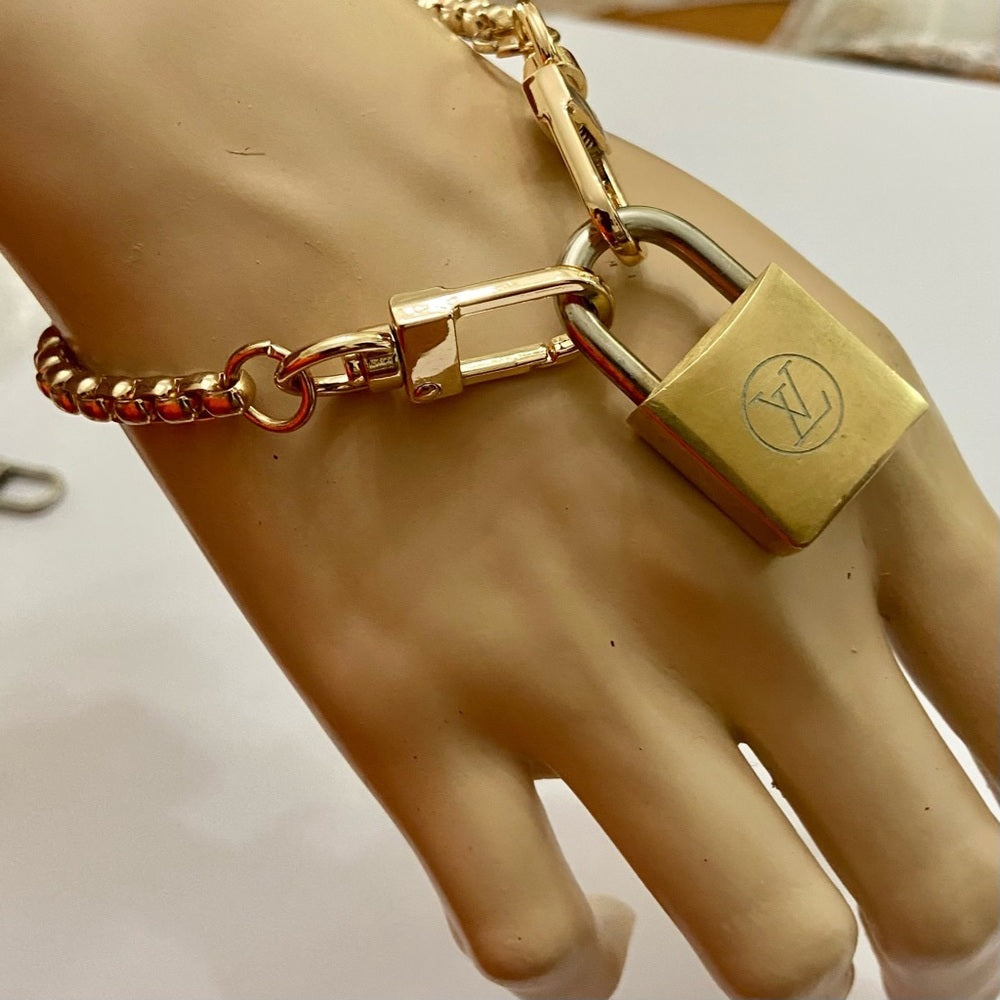 Vintage, Louis Vuitton Brass Padlock with 7-8in Gold Tone Chain Bracelet (A)