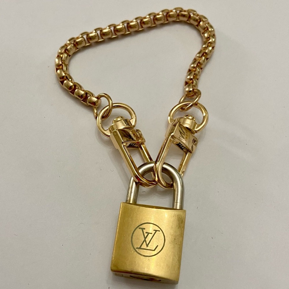 Vintage, Louis Vuitton Brass Padlock with 7-8in Gold Tone Chain Bracelet (A)