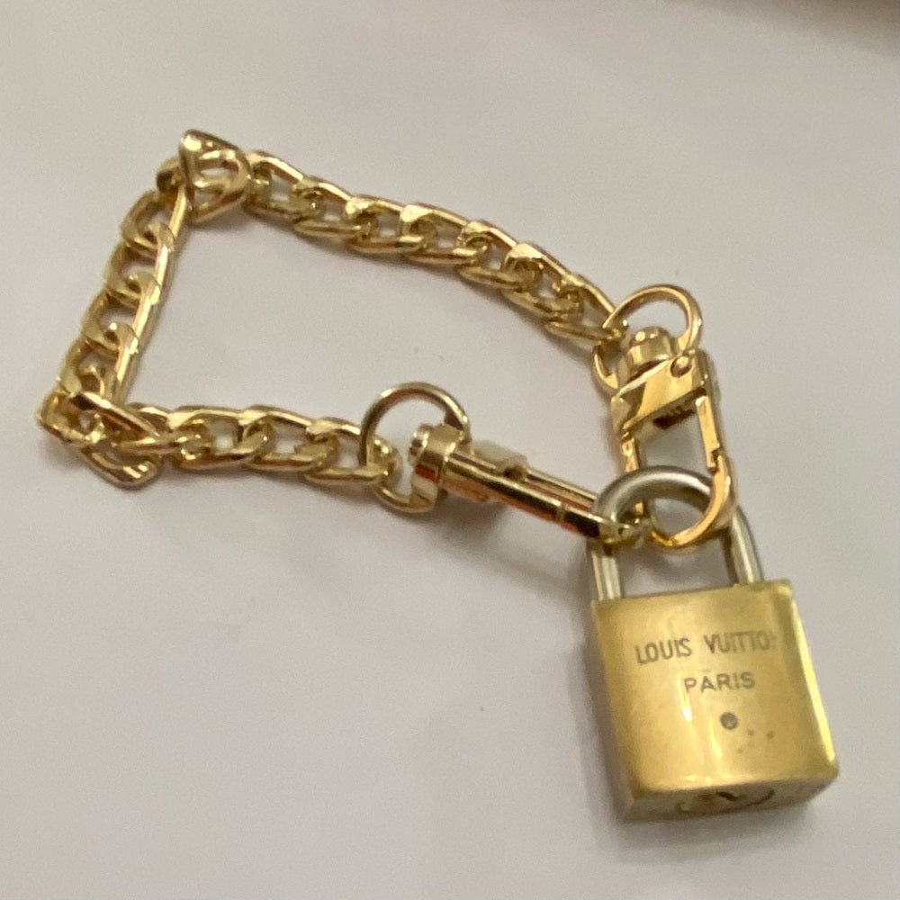 Vintage, Louis Vuitton Brass Padlock with 7-8in Gold Tone Chain Bracelet (A)