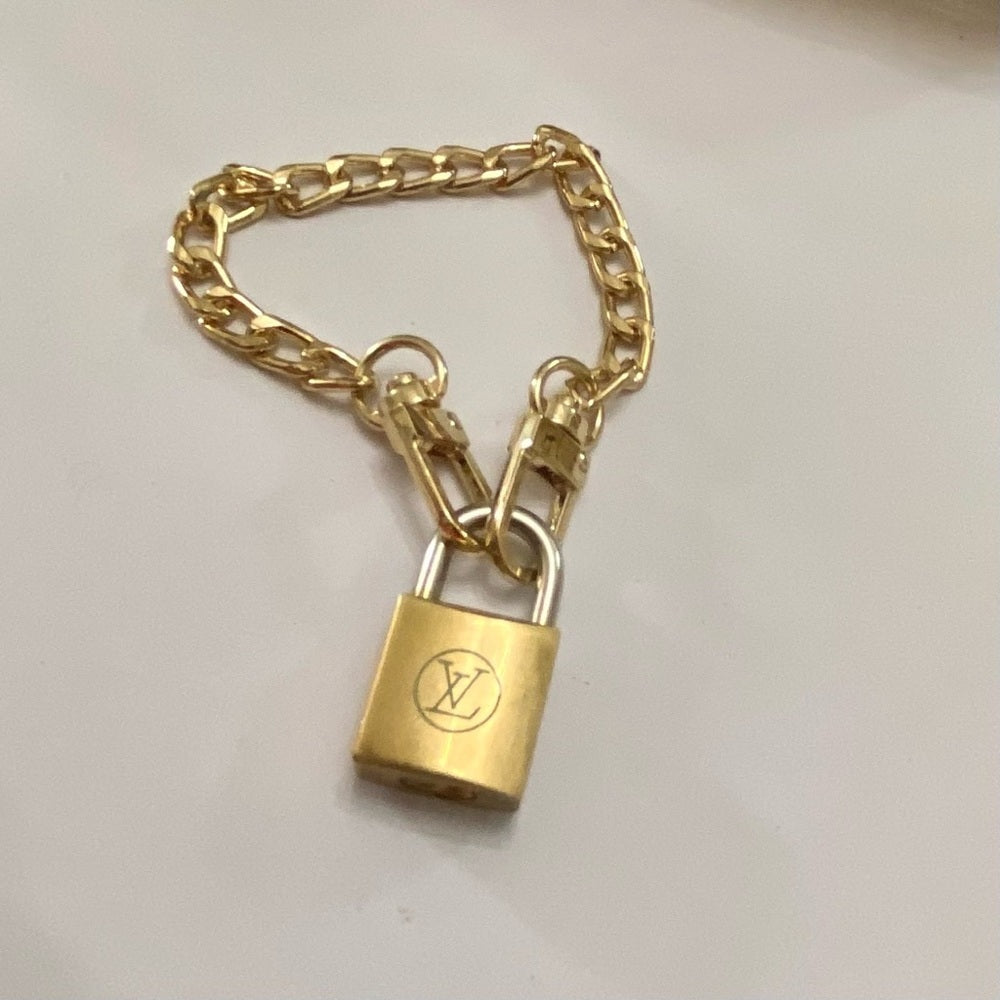 Vintage, Louis Vuitton Brass Padlock with 7-8in Gold Tone Chain Bracelet (A)