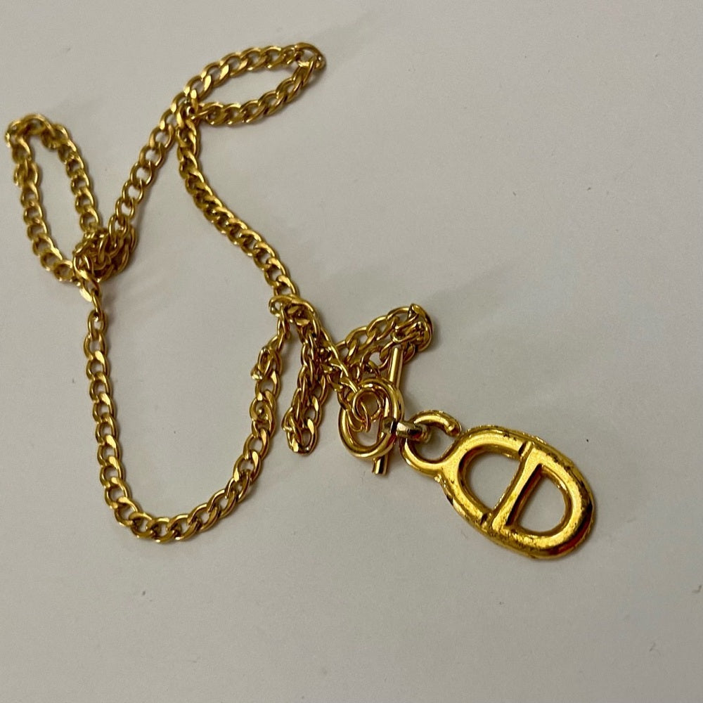 Christian Dior Gold Tone Charm with 18in Gold Plated Chain Necklace
