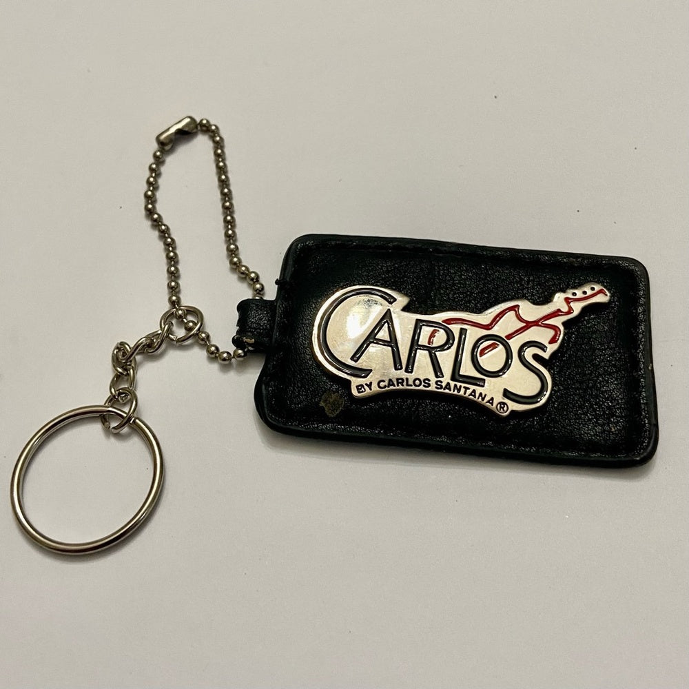 Stunning, 2-Way, Carlos Santana Black Leather Handbag Charm-Key Chain