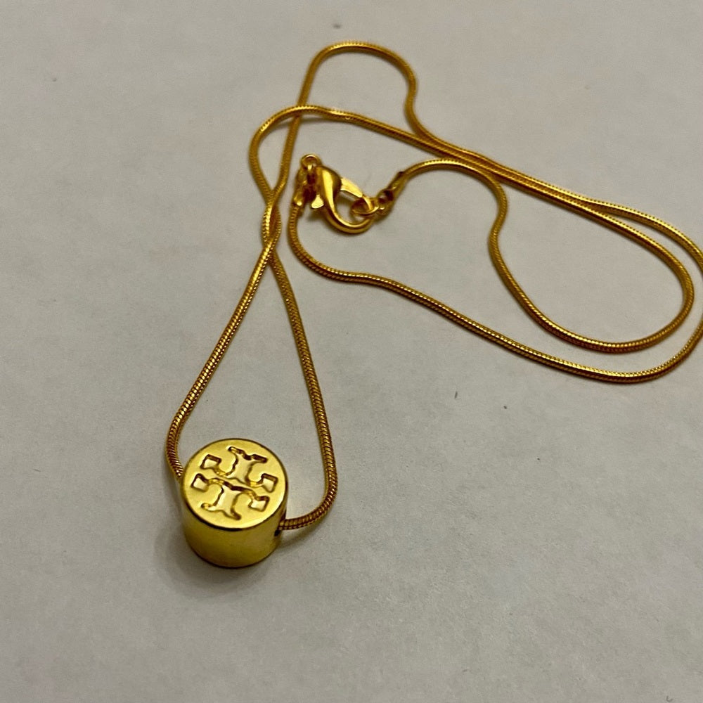 Tory Burch Gold Tone Charm with 18in Gold Plated Chain Necklace