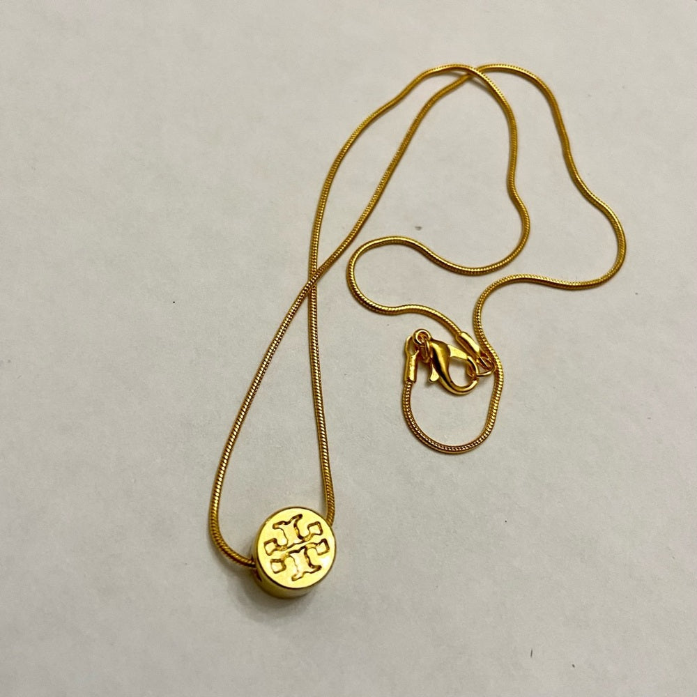 Tory Burch Gold Tone Charm with 18in Gold Plated Chain Necklace