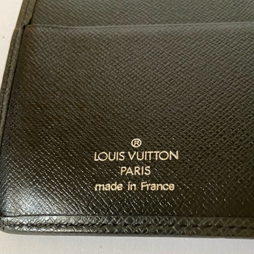 Louis Vuitton, Black Taiga Leather Unisex Long Wallet 7.5 x 4in