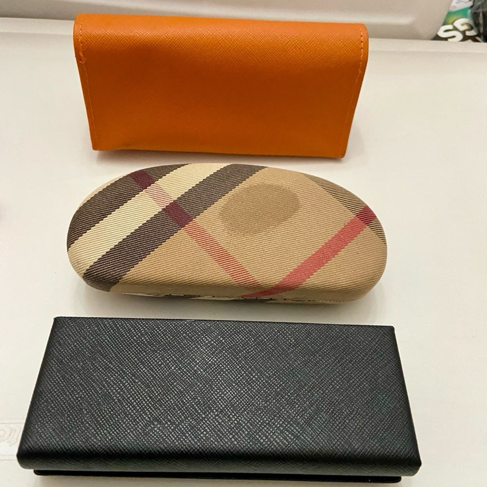 Three Sunglasses Cases- Burberry, Prada and Tory Burch
