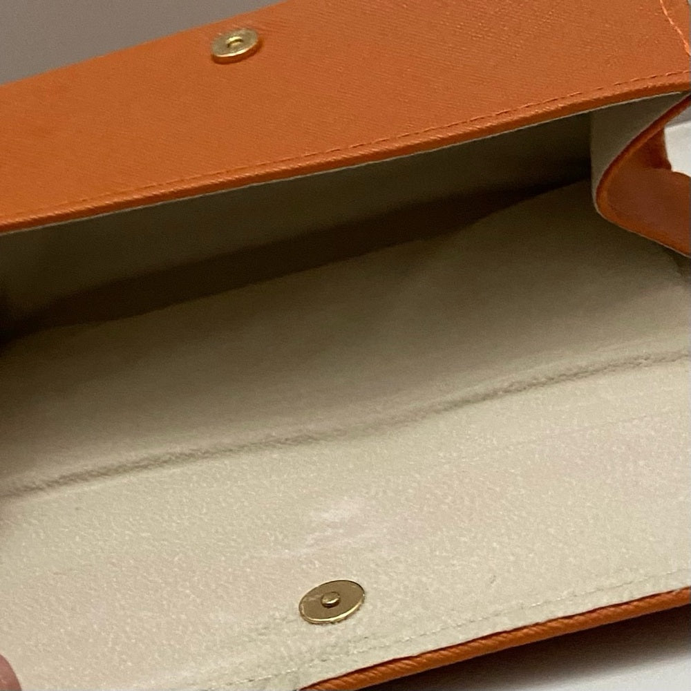 Three Sunglasses Cases- Burberry, Prada and Tory Burch