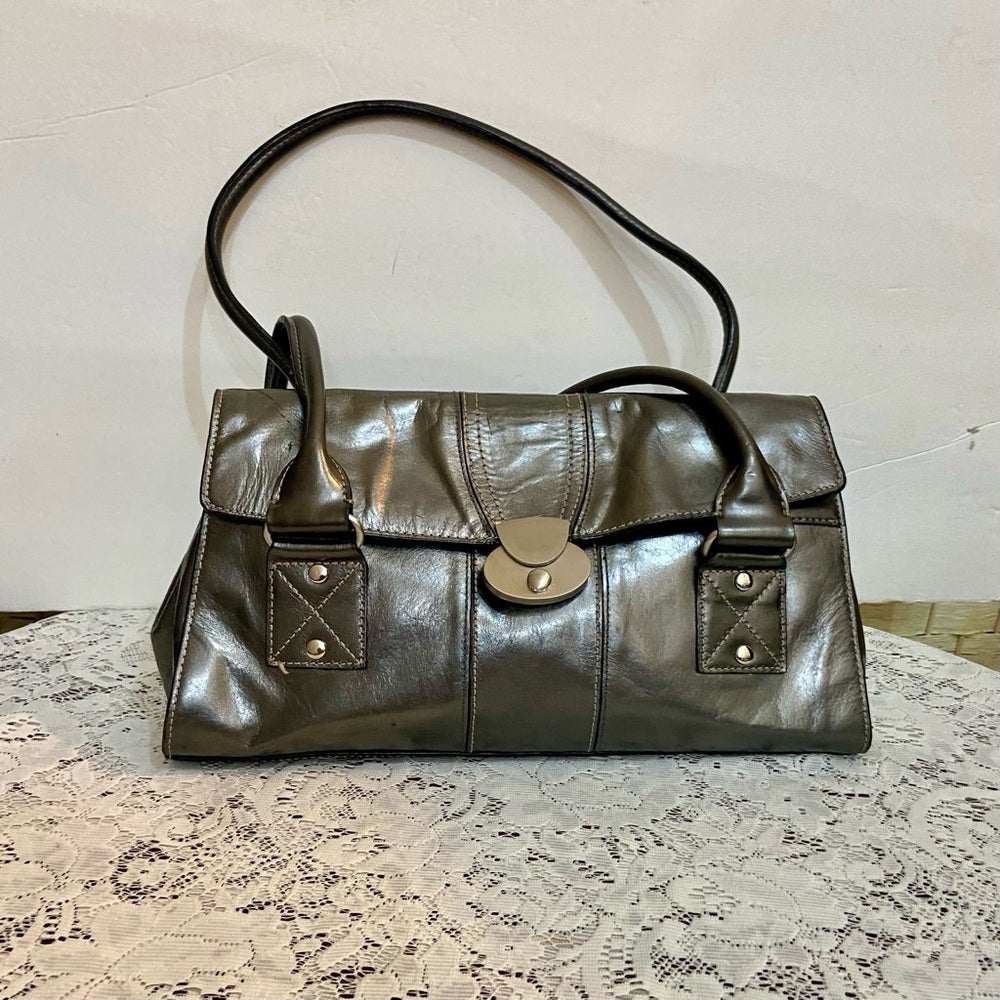 East 5th Metallic Silver Faux Leather Handbag. (13.5in x 7.5in x 3.5in)