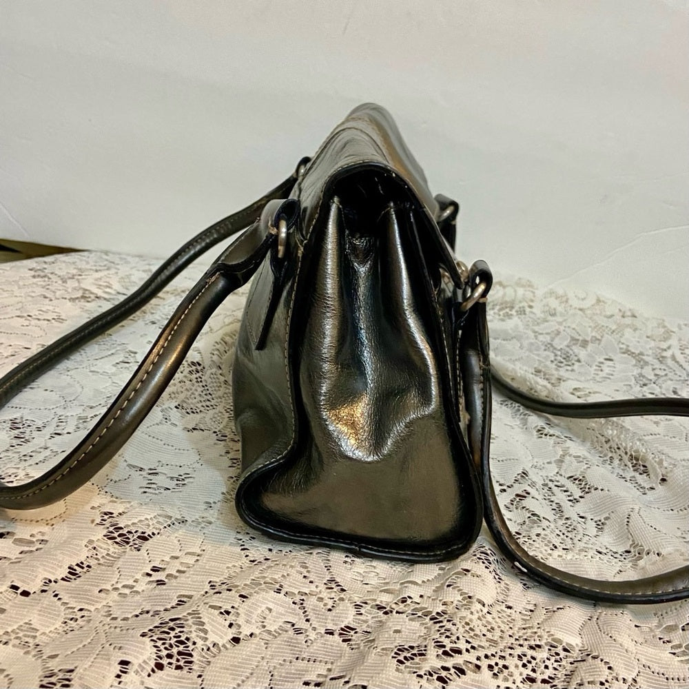 East 5th Metallic Silver Faux Leather Handbag. (13.5in x 7.5in x 3.5in)