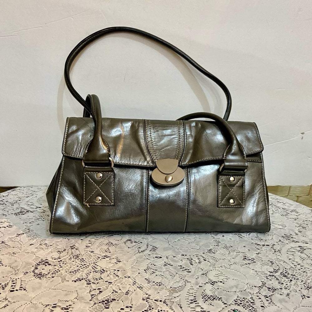 East 5th Metallic Silver Faux Leather Handbag. (13.5in x 7.5in x 3.5in)