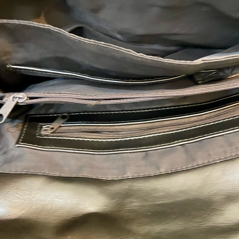 East 5th Metallic Silver Faux Leather Handbag. (13.5in x 7.5in x 3.5in)