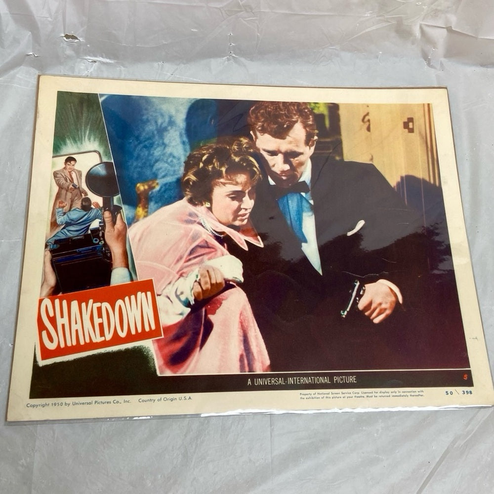 The Voice in the Night (1941) and Shakedown (1950) Movie Posters