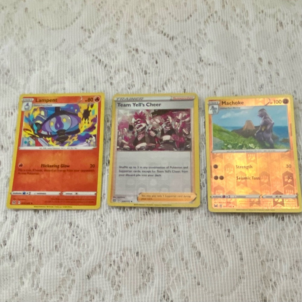 Lot (N) : 3 Pokemon Reverse Holo Cards and 3 Pokemon Gold Fan Arts