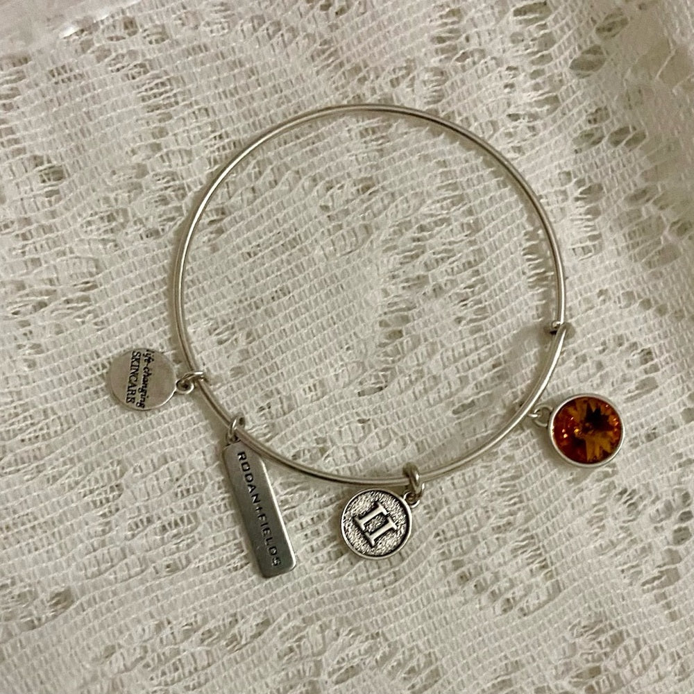 Lot of 2 Vintage Silver Tone Bracelets- Rodan Fields and Pink Agate Cuff Bangle