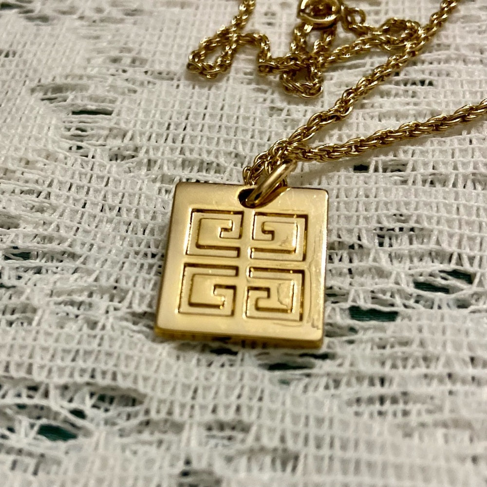 Vintage Givenchy Gold Tone Charm with 22-inch Gold Plated Chain Necklace