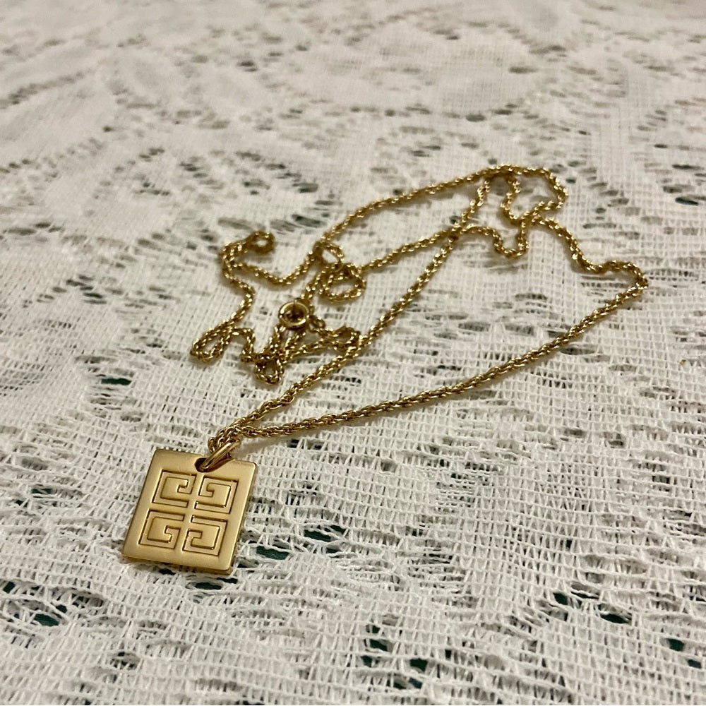 Vintage Givenchy Gold Tone Charm with 22-inch Gold Plated Chain Necklace