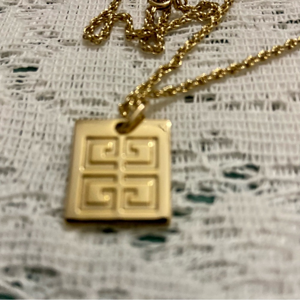 Vintage Givenchy Gold Tone Charm with 22-inch Gold Plated Chain Necklace