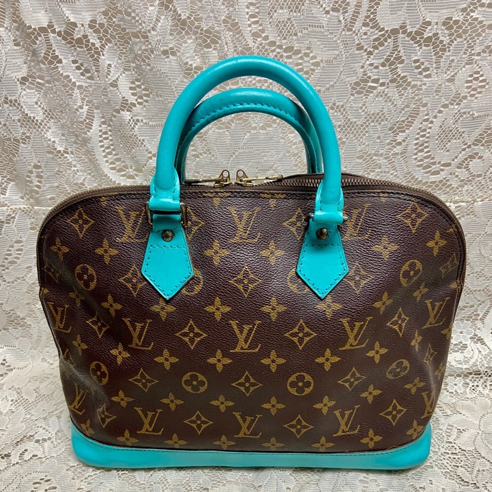 Louis Vuitton Alma Handbag w/ Aquamarine Leather Trim 10in x 12in x 6.5in