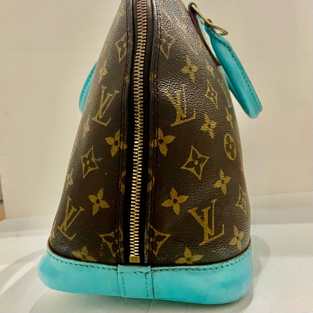 Louis Vuitton Alma Handbag w/ Aquamarine Leather Trim 10in x 12in x 6.5in
