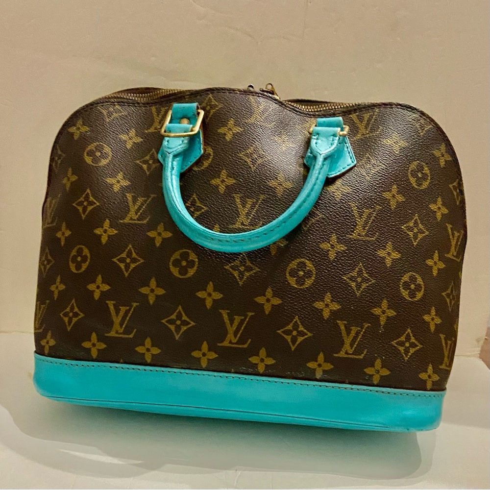 Louis Vuitton Alma Handbag w/ Aquamarine Leather Trim 10in x 12in x 6.5in