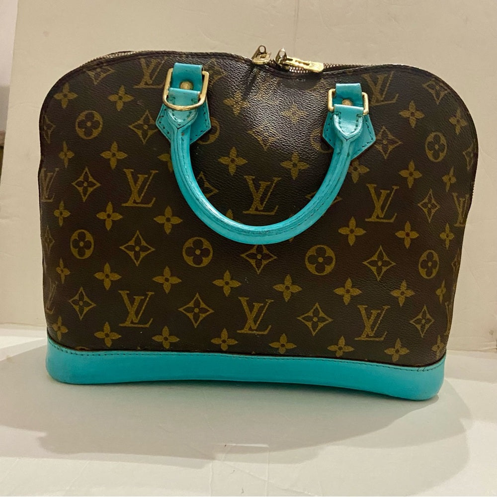 Louis Vuitton Alma Handbag w/ Aquamarine Leather Trim 10in x 12in x 6.5in