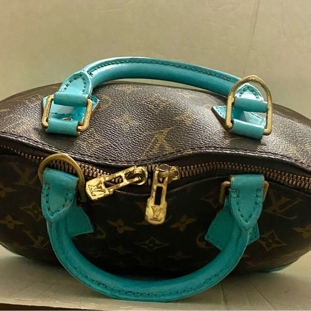 Louis Vuitton Alma Handbag w/ Aquamarine Leather Trim 10in x 12in x 6.5in