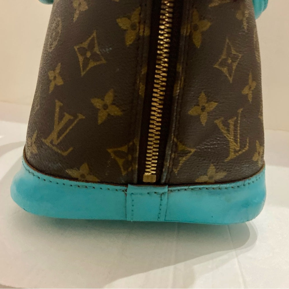 Louis Vuitton Alma Handbag w/ Aquamarine Leather Trim 10in x 12in x 6.5in