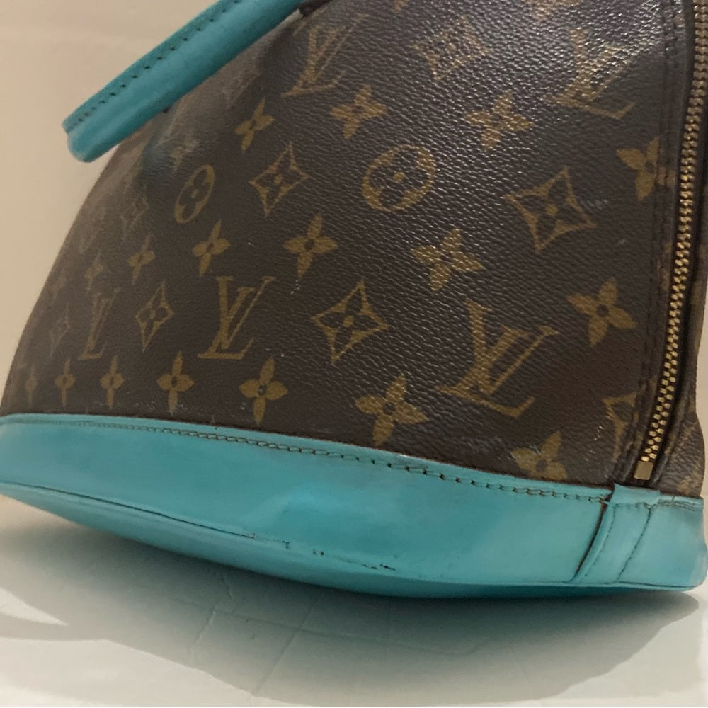 Louis Vuitton Alma Handbag w/ Aquamarine Leather Trim 10in x 12in x 6.5in