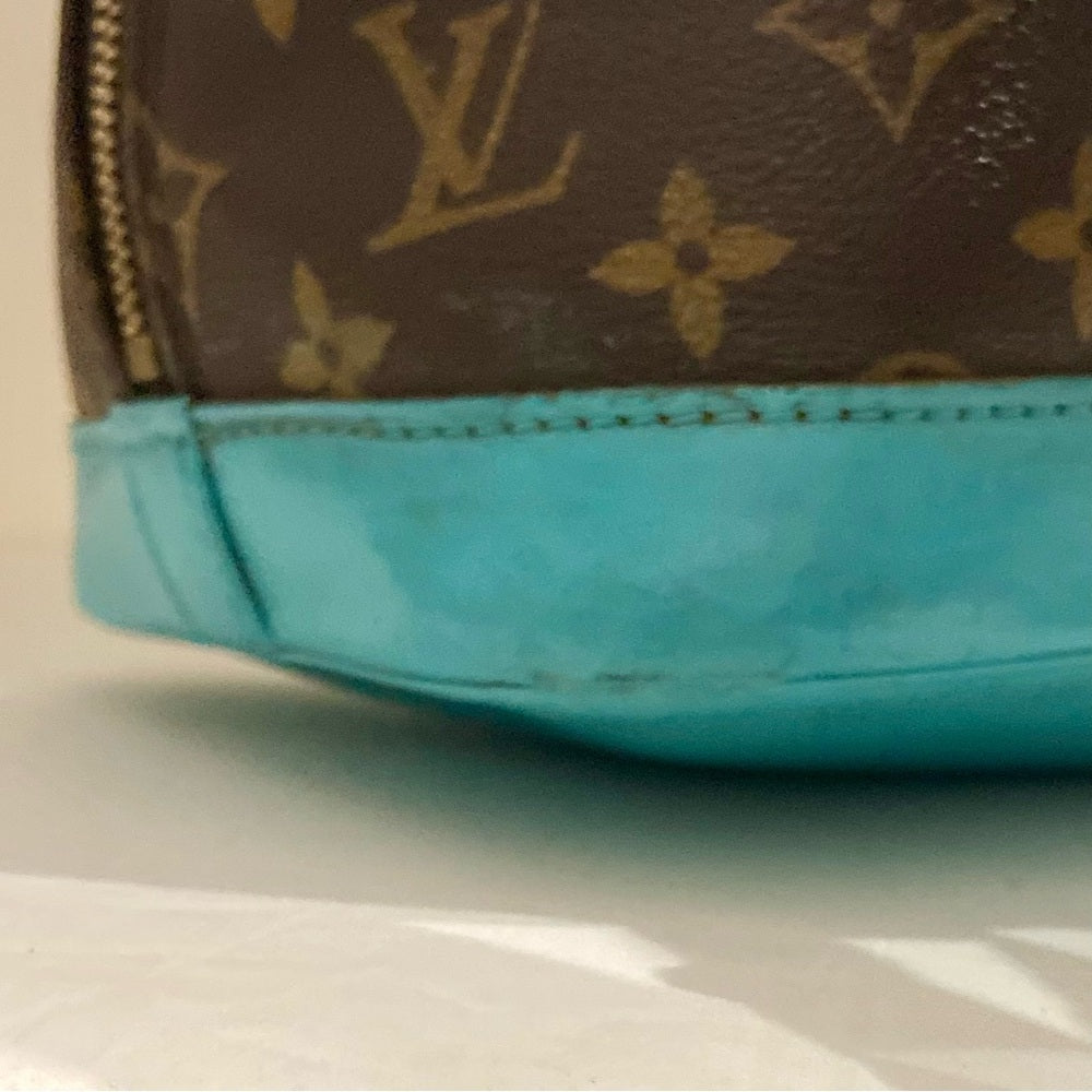Louis Vuitton Alma Handbag w/ Aquamarine Leather Trim 10in x 12in x 6.5in