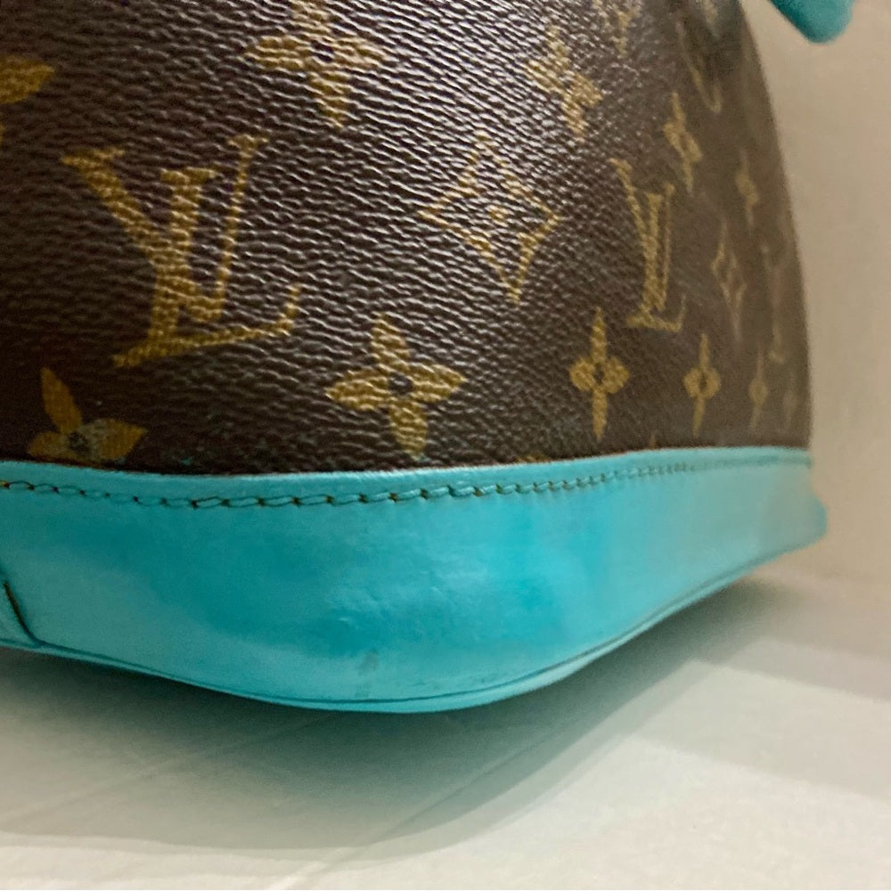 Louis Vuitton Alma Handbag w/ Aquamarine Leather Trim 10in x 12in x 6.5in