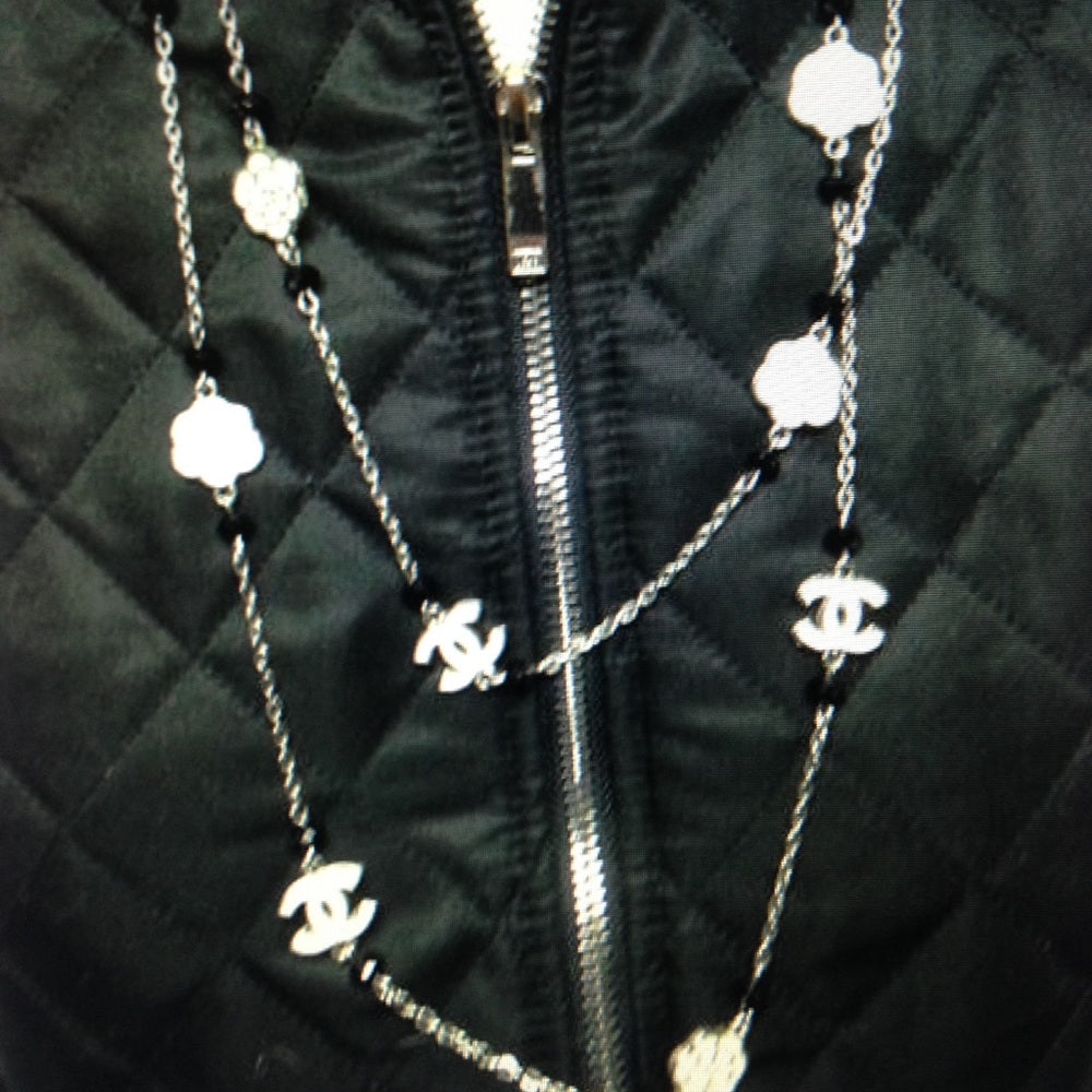 Elegant Black and White Camelia Enamel Necklace