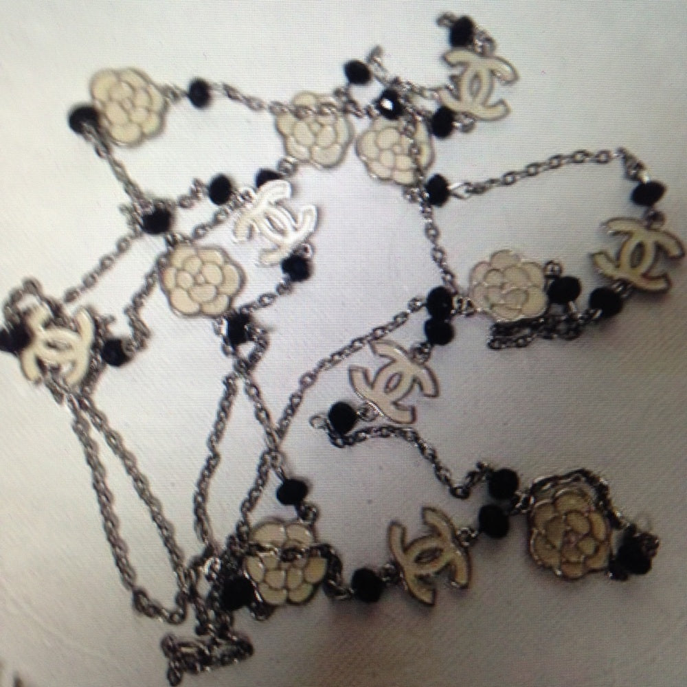 Elegant Black and White Camelia Enamel Necklace