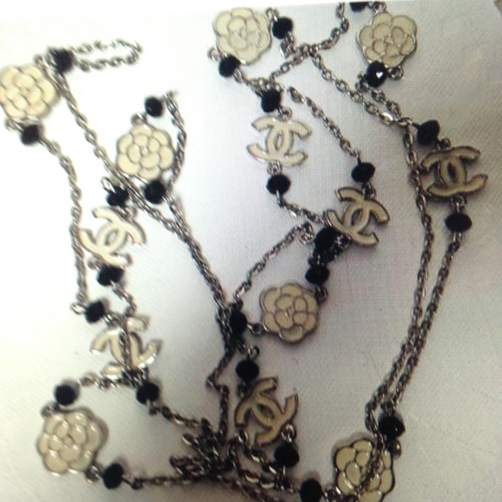 Elegant Black and White Camelia Enamel Necklace