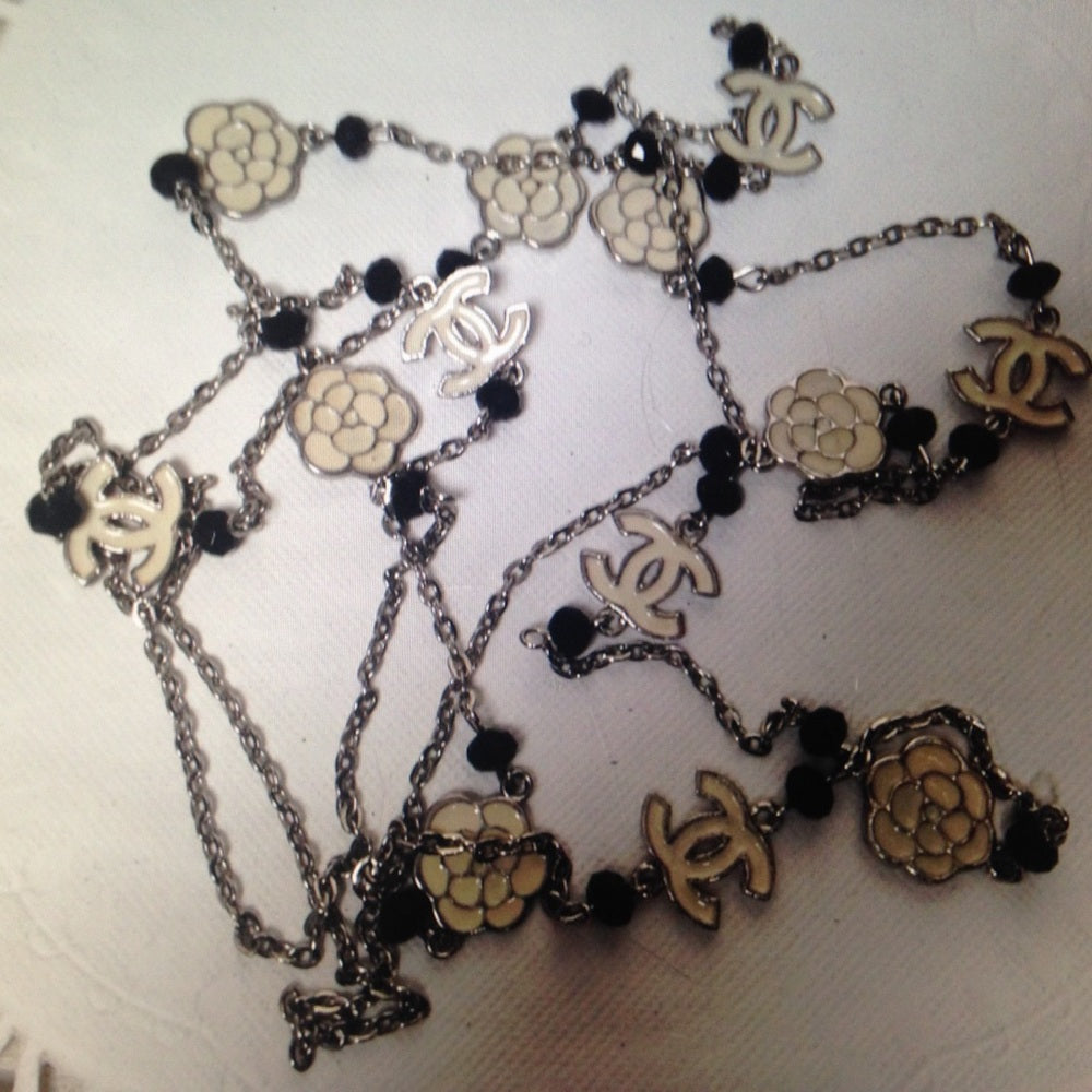Elegant Black and White Camelia Enamel Necklace