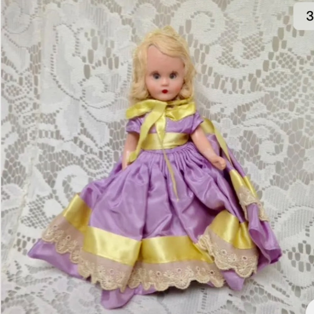 Vintage1940-50s 5.5in Nancy Ann Story Book Doll in Purple and Yellow Gown/Hat