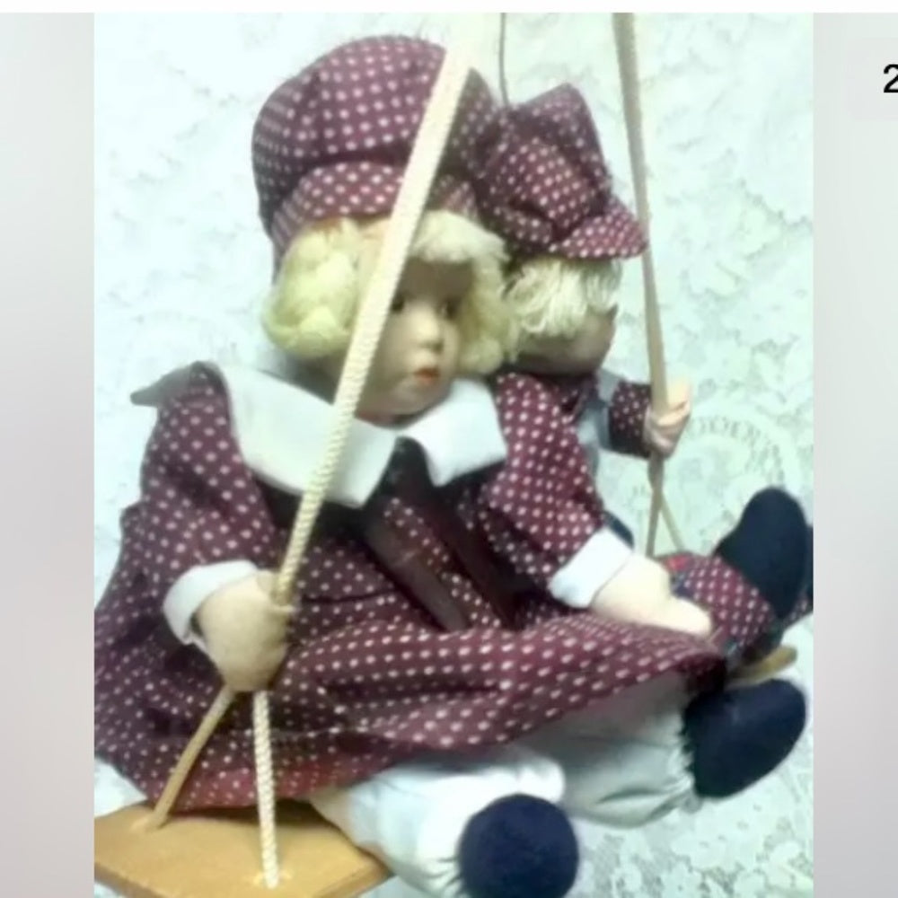 Beautiful, 9-inch, Boy And Girl Dolls on a Swing
