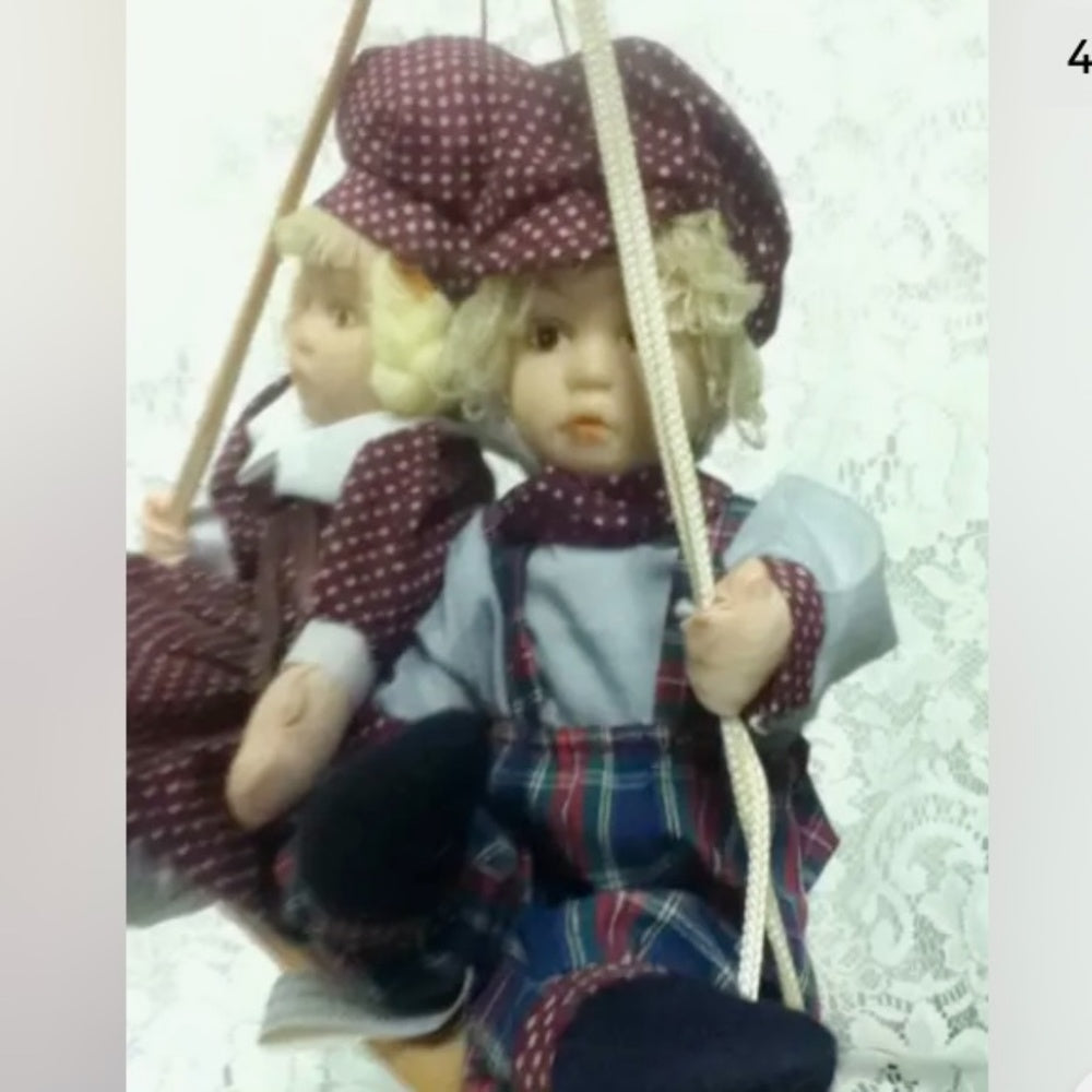 Beautiful, 9-inch, Boy And Girl Dolls on a Swing