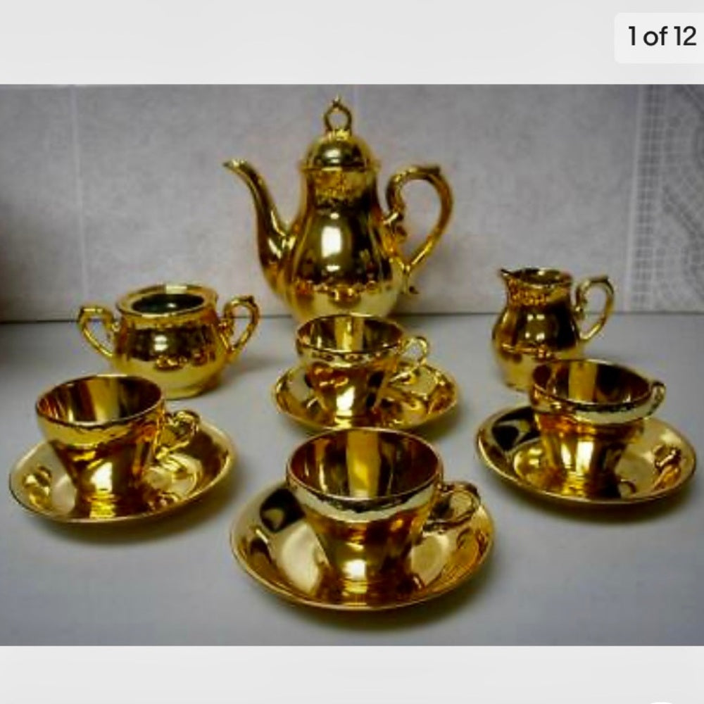 Vintage, Made in Japan, 12-pc Musical-Gilded Ceramic Tea Set (sftz) This is a
