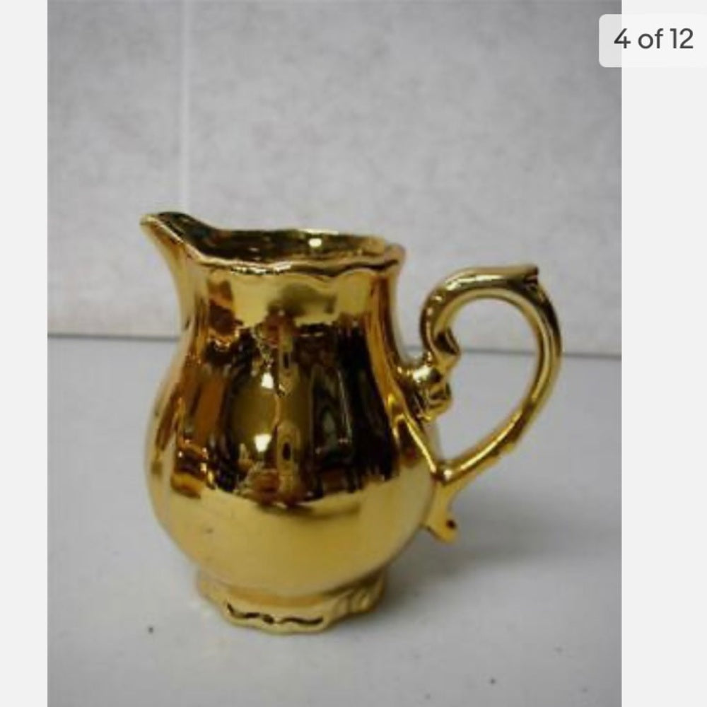 Vintage, Made in Japan, 12-pc Musical-Gilded Ceramic Tea Set (sftz) This is a
