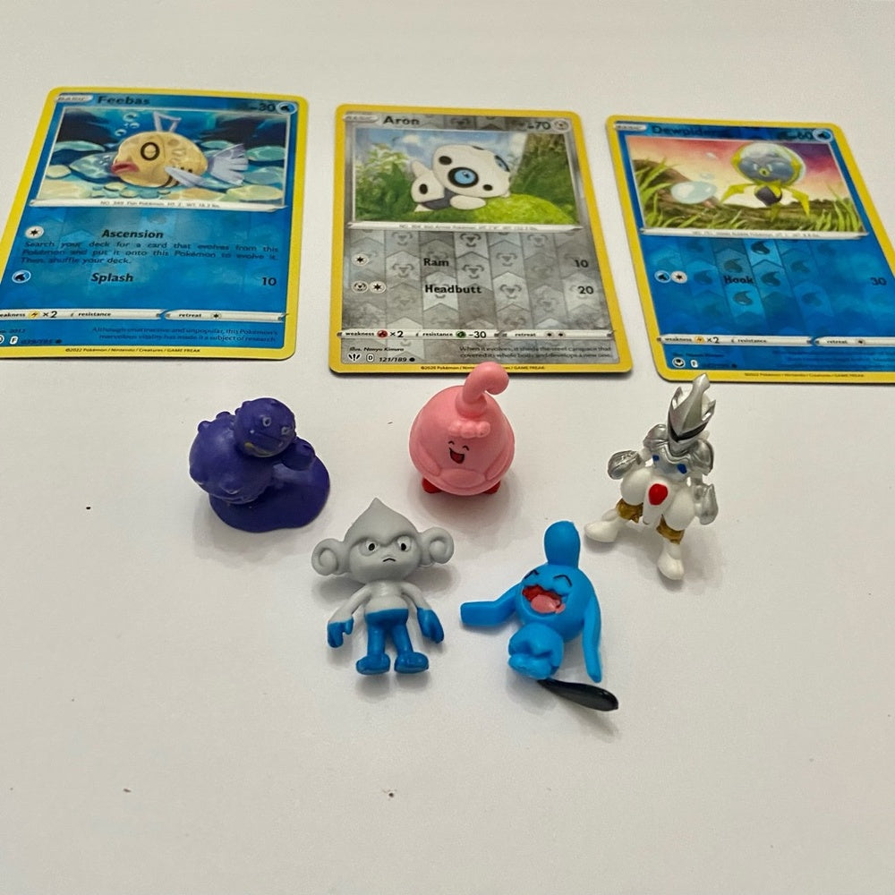 Lot (C): 3 Pokemon Reverse Holo Cards and 5 Pokemon Figures