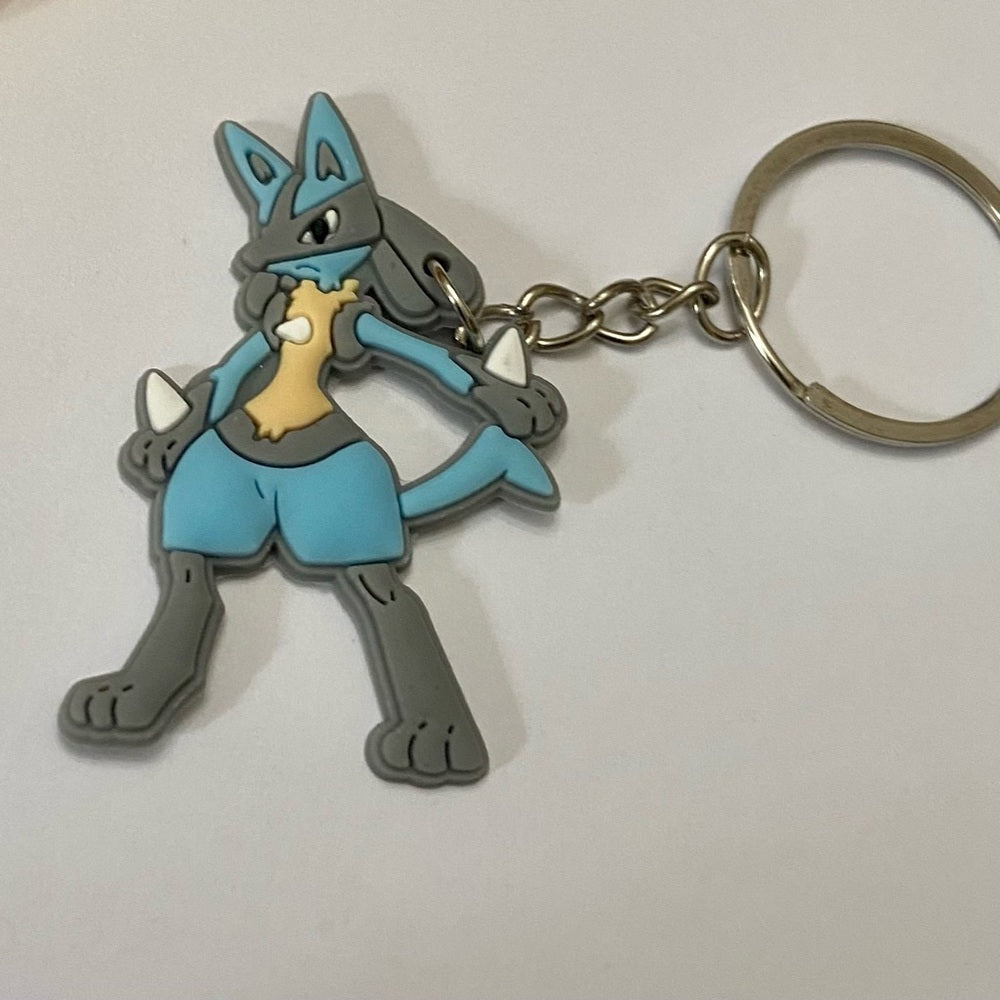 Lot of 8pc Pokemon Collectibles. (C)