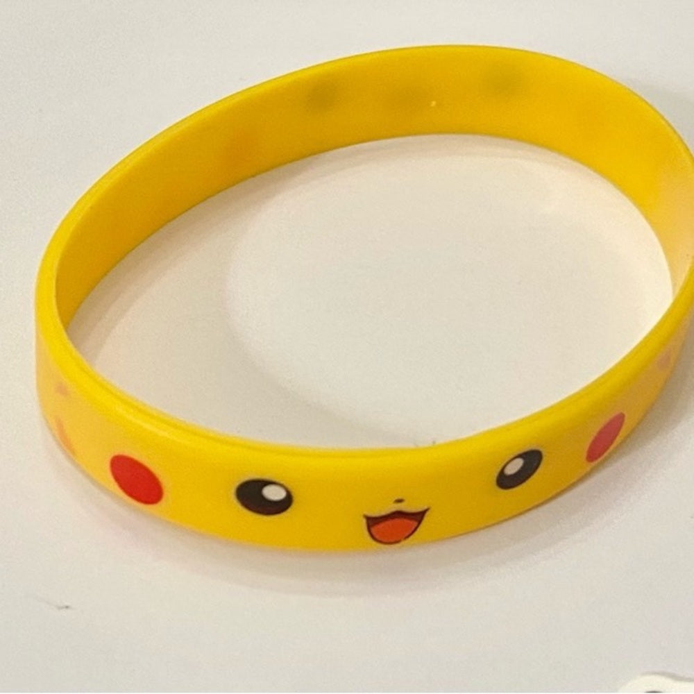 Lot of 8pc Pokemon Collectibles. (C)