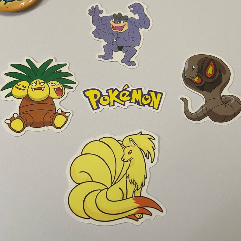 Lot of 8pc Pokemon Collectibles. (C)
