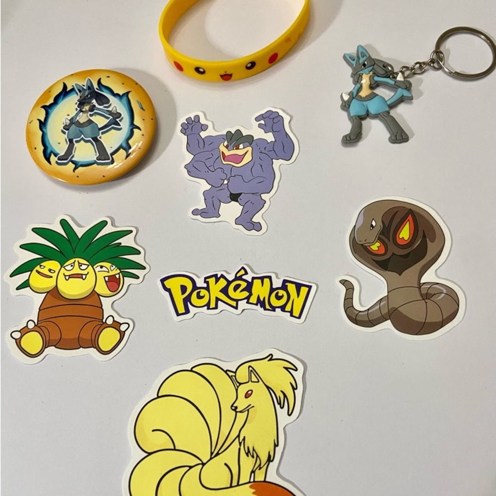 Lot of 8pc Pokemon Collectibles. (C)