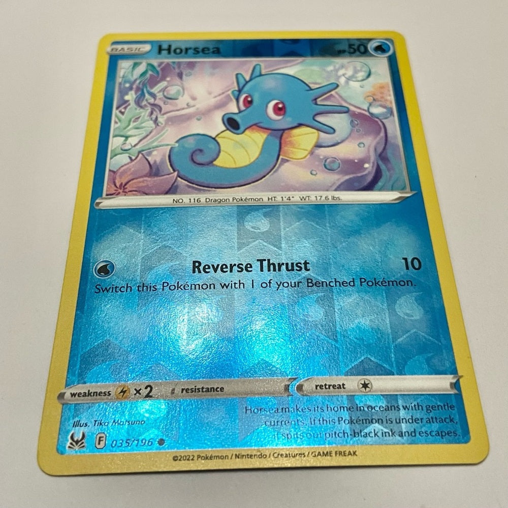 Lot (A): 3 Pokemon Reverse Holo Cards and 5 Pokemon Figures