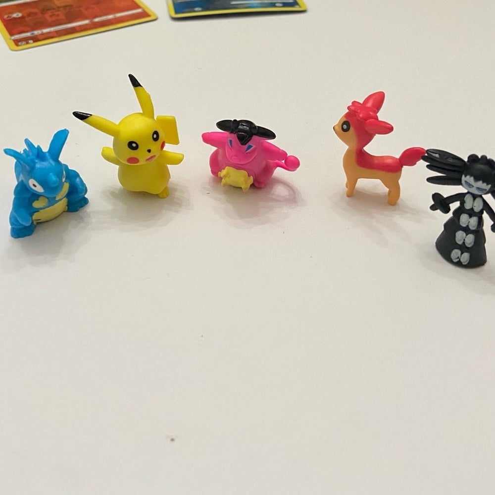 Lot (B): 3 Pokemon Reverse Holo Cards and 5 Pokemon Figures