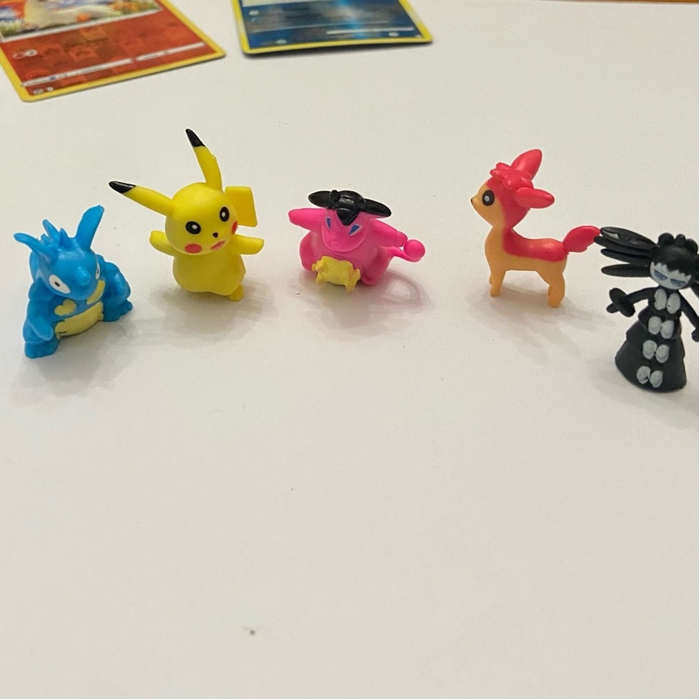Lot (B): 3 Pokemon Reverse Holo Cards and 5 Pokemon Figures